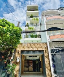 NHÀ MẶT TIỀN XÂY MỚI 6 TẦNG THANG MÁY • GẦN CV LÀNG HOA P16