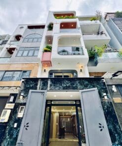 NHÀ XÂY MỚI 5 TẦNG THANG MÁY • GẦN CV LÀNG HOA P11